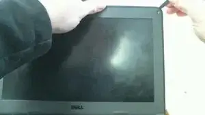 Using the <a href="../../home/unavailable_offline?url=/products/metal-spudger" class="product-link">metal spudger</a> or your favorite pry tool, lightly seperate the bezel frame from the chromebook. Start in one of the top corners near the screws.