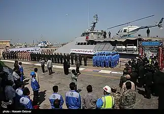A Bell 206 helicopter landing on the vessel