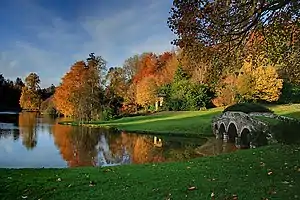 Image 32Autumn colours at Stourhead, an English landscape garden (from List of garden types)