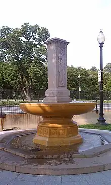Fountain with a carved pillar in the center