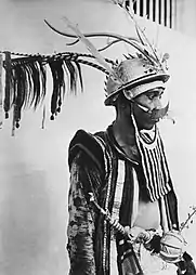 Indonesian warrior with Takula Tofao helmet.