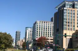 Skyline of the Central West end as seen from Forest Park. The building on the far left is One Hundred Above the Park and the buildings on the right are a part of the Barnes-Jewish Hospital complex.