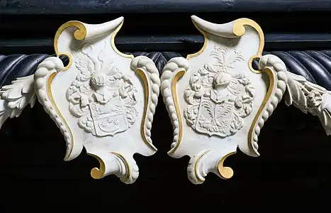 Kingo's and his wife's coats of arms from the screen.