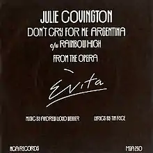 The song and artist name in white font against a dark blue background.