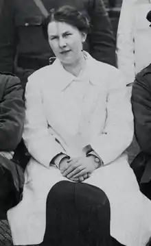 Black and white photograph of Dulcie Mary Pillers, seated front row, next to Ernest William Hey&nbsp;Groves (not shown). Taken from a group photograph of the medical staff at the hospital near the end of World War I.