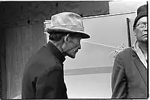 Photograph of two elderly Filipino tenants who were evicted from the International Hotel in San Francisco