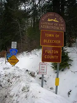 Signage along County Route 125 entering the town of Bleecker and Fulton County