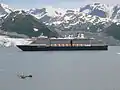 Holland America Line's MS Oosterdam passing Turner Glacier while leaving Disenchantment Bay
