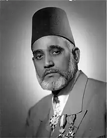 JM Abdul Aziz seen wears the Commander around his neck.[citation needed]