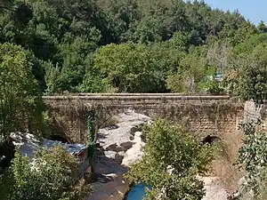 Bridge over Nahr (river) Damour known in English as the judges bridge. Was built by Emir Zayn ad-Dine at-Tannoukhi who was judge  at Ain Ksour