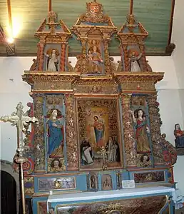 The baroque "Rosary" altarpiece in the Église Sainte-Geneviève at Loqueffret