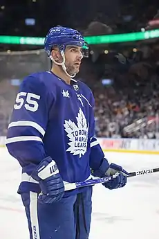 Giordano observes his teammates (off-camera) during a pre-game warm up