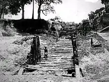 Mauryan remains of a wooden palissade at Bulandi Bagh site, 1926–27.