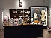 An interactive exhibit for trying on historic cloths