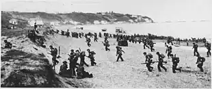 American troops land on an Algerian beach during Operation Torch
