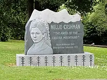 stone monument with an engraving of a woman