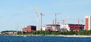 Image 136Olkiluoto 3 under construction in 2009. It was the first EPR, a modernized PWR design, to start construction. (from Nuclear power)