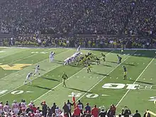 American football players during a play