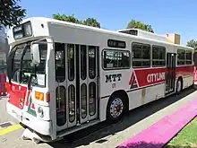 1970s white and red bus