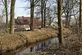Farmhouse near a stream