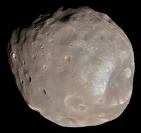Image 14Phobos (moon)Photo credit: Mars Reconnaissance OrbiterPhobos, the larger and closer of the two moons of Mars, as seen from about 6,000 kilometres (3,700 mi) away. A small, irregularly shaped object, Phobos orbits about 9,377 km (5,827 mi) from the center of Mars, closer to its primary than any other planetary moon. The illuminated part of Phobos seen in the images is about 21 km (13 mi) across. The most prominent feature in the images is the large crater Stickney in the lower right. With a diameter of 9 km (5.6 mi), it is the largest feature on Phobos.More selected pictures