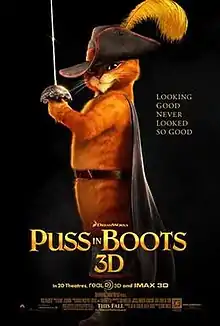 Theatrical poster showing Puss in Boots, an orange cat wearing a hat with a feather on, boots, and a cape in the black background. Tagline in gold to the side reads &quot;Looking Good Never Looked So Good,&quot; with &quot;Puss in Boots 3D&quot; in large gold lettering underneath.