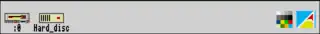 Screenshot of the icon bar under RISC OS 2 showing the following: Left portion, from left&nbsp;–  Discs (in this case a floppy disc and hard disc), Right portion, from right&nbsp;–  Task Manager, Display Manager