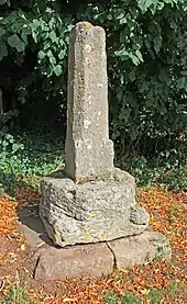 Cross 15 m north of St Peter's Church