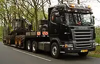 Scania R 500 LA6x2HHA tractor unit with pre-2009 styling in the Netherlands.