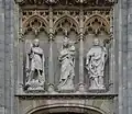 Statues of Michael, Mary and Leonardus, above the portal of :nl:Sint-Leonarduskerk in Saint Lenaarts