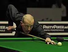 Steve Davis playing a shot