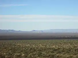 View across the Tucson Basin towards Tumamoc Hill (left) and "A" Mountain (right), which can be seen in the center of the background.