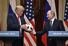 Putin gifts Trump a Telstar Mechta, the official match ball for the knockout stage of the 2018 FIFA World Cup.