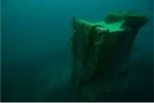 Submerged box-like structure.